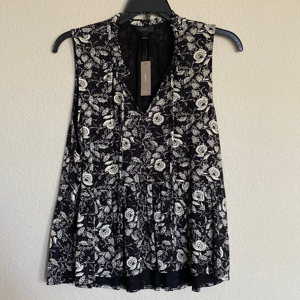 Knit peplum black white printed top with tie neck